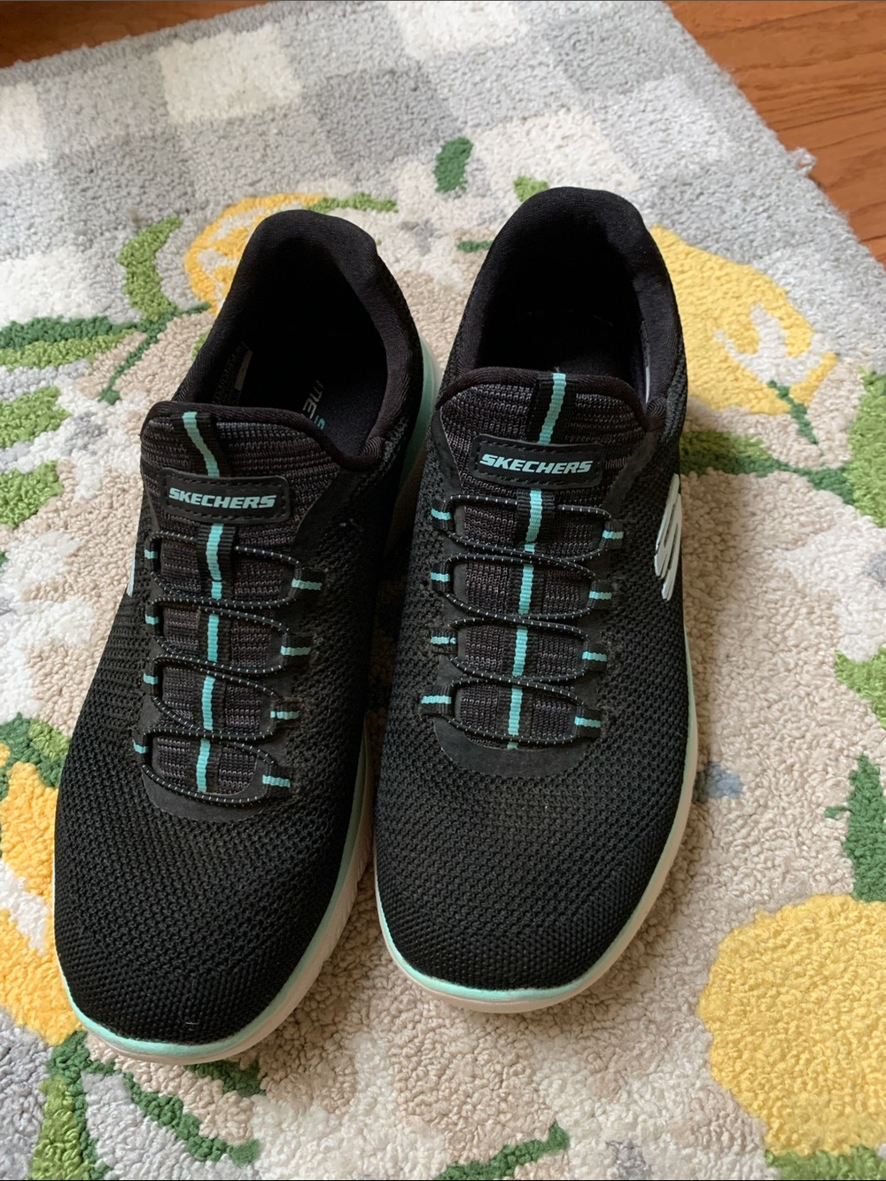 Skechers Women’s Black Athletic Sneakers with Teal Accents
